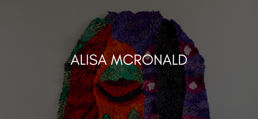 Text reads Alisa McRonald on black overlayed image of a textile piece of a face.